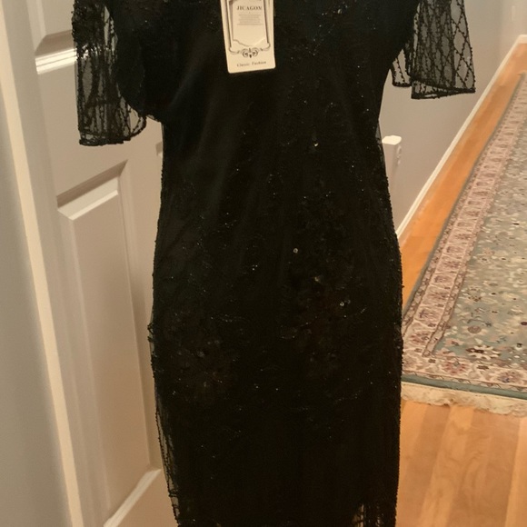 NWOT Ladies roaring 20’s era dress in black. Black sequins and fringe. Size XL - Picture 2 of 7